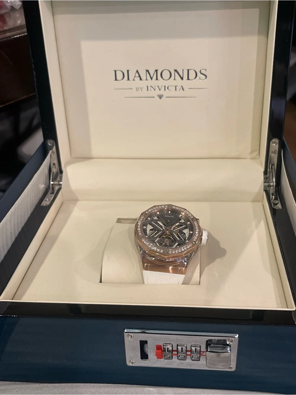 Invicta Rose Gold Skeleton Dial Watch with White Silicone Band and Crystal Bezel